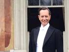 Suited and booted: Richard E Grant on the set of Downton Abbey