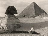 Picture of a man sitting in front of the Great Sphinx