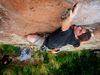 Photo: Man climbing rock face in Cordoba Argentina
