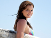 Picture of surfer Maya Gabeira on a beach