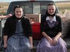 Photo: Lori Hofer and Megan Hofer sitting on a truck