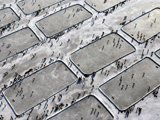 Aerial photo of hockey players on outdoor rinks