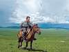 Photo: Albert Lin on horse