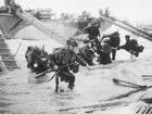 Troops from the 48th Royal Marines at Saint-Aubin-sur-mer on Juno Beach, Normandy, France, during the D-Day landings, 1944
