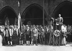 Alfred Rosenberg, leading Nazi ideologist (on podium at right)