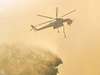 Photo: Helicopter drops water above wildfire in Colorado