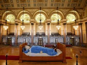 23 July 2014: The Grandmother Giant sleeps in St George's Hall, one of the giant Royal De Luxe street puppets taking part in Liverpool's World War I centenary commemorations in Liverpool