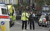 terrorism: police blocking off a road in London [Sergio Dionisio/AP] 