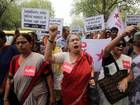 Protesters from various organisations shout slogans against the Uttar Pradesh government during a protest in New Delhi, India, on 31 May, 2014