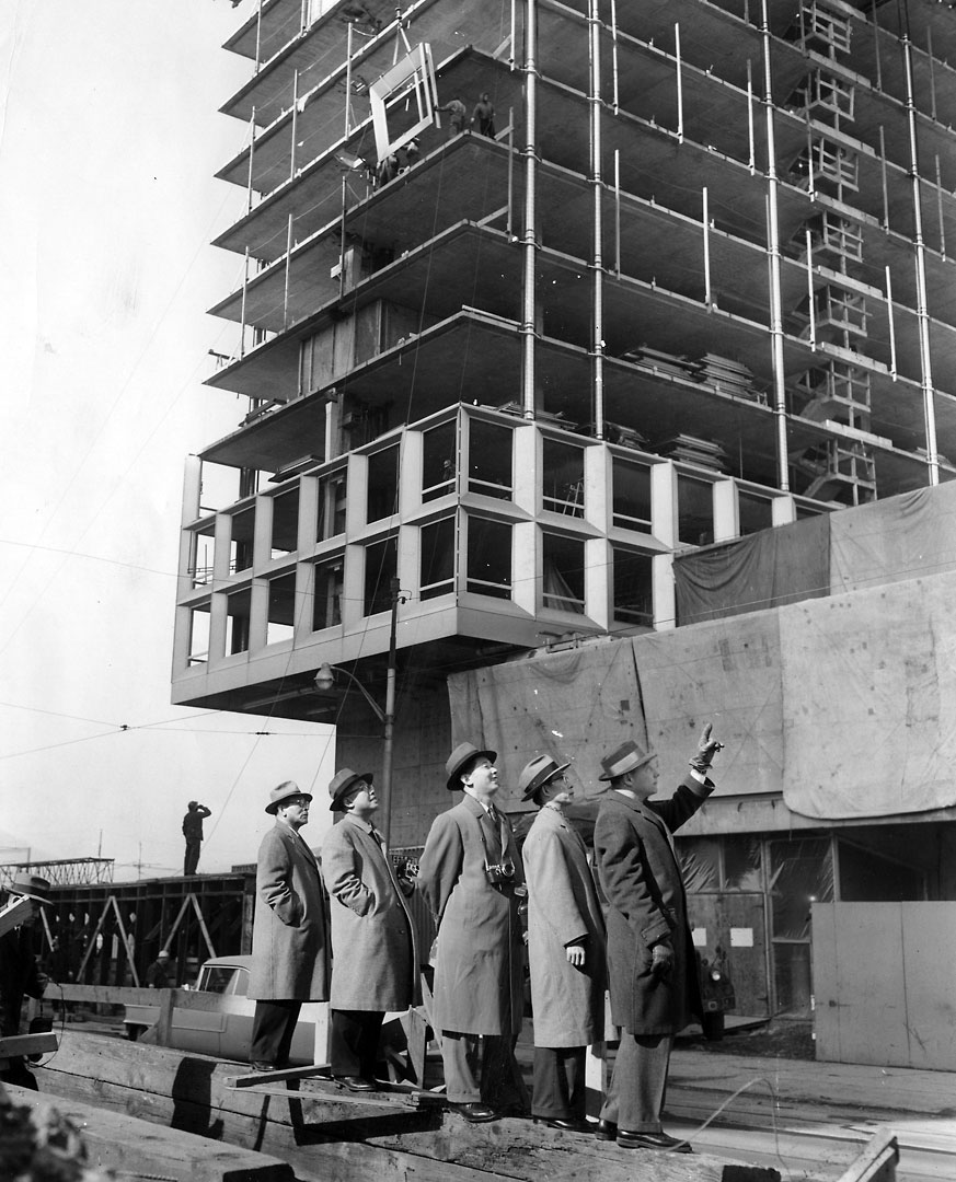 Japanese construction men examined the building in February 1959. (Pittsburgh Press photo)