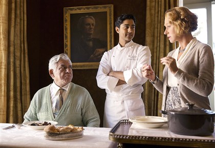 Hundred2-1 Hassan (Manish Dayal, center) serves his father (Om Puri) Beef Bourguinon Ã¡ la Hassan, a classic French dish with an Indian twist, as Madame Mallory (Helen Mirren) explains its significance to French chefs. Â©DreamWorks II Distribution Co., LLC. All Rights Reserved.