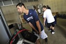  Penn State team managers Nick Venturino, left, and Evan Tucker load equipment to be shipped to Ireland on Tuesday. Penn State plays Central Florida in the Croke Park Classic in Dublin on Saturday.