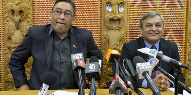Mana Party leader Hone Harawira, left, and Internet Party chief executive Vikram Kumar announce their deal to form the Internet Mana Party at a press conference at Parliament. Photo / Mark Mitchell