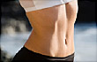 Young woman with flat abs