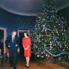 Onassis, Jacqueline Kennedy: John and Jacqueline Kennedy, in the Blue Room of the White House at Christmastime, 1961 [Robert Knudsen—Official White House Photo/John F. Kennedy Presidential Library] 