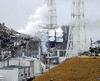 Japan earthquake and tsunami of 2011: damaged containment buildings at the Fukushima Daiichi nuclear power plant [Tokyo Electric Power Co.—Kyodo News/AP] 