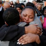 The mother of Jahi McMath, Nailah Winkfield, embraces her brother Omari Sealey, after they stated that the court order to remove Jahi from a ventilator was extended to Jan. 7 2014.