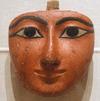 Egyptian sculpture: face from a coffin [Photograph by Lisa O’Hara. Brooklyn Museum, New York, Charles Edwin Wilbour Fund, 37.2037E] 