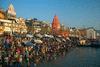 tourism: Hindu pilgrims bathing in the Ganges River at Varanasi, Uttar Pradesh state, India [Frans LemmensThe Image Bank/Getty Images] 