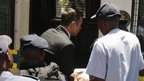 Pistorius gets into police van after leaving court - 21 October