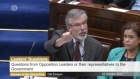 Taoiseach Enda Kenny has had angry exchanges with Sinn Féin leader Gerry Adams in the Dáil following his meeting with Máiria Cahill.