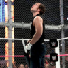 Dean Ambrose in a Hell in a Cell match with Seth Rollins.