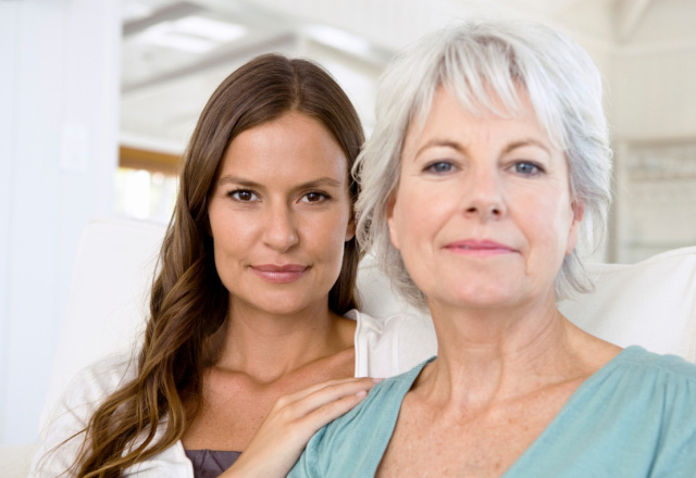  Two women standing side by side in a medical office