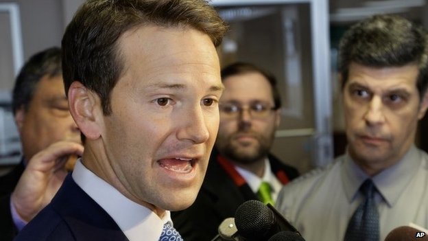US Representative Aaron Schock speaks to reporters before meetings with constituents after a week in which he faced twin scandals 6 February 2015