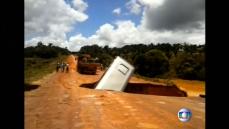 Brazilian bus falls through hole