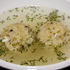 Matzo ball soup with dill. Matzo represents the unleavened bread the Jews ate while fleeing Egypt.
