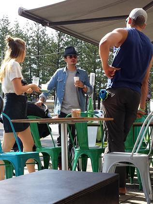 Orlando Bloom enjoying coffee at Elk Espresso this morning with a nanny and minder, with 