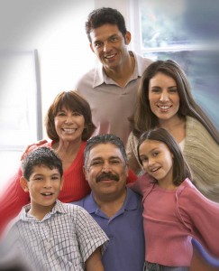 Smiling Hispanic family.