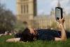 A man reads a Kindle in Victoria Tower Gardens. Image: Getty.