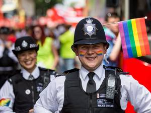 Police officers take part in the annual Pride in London Parade