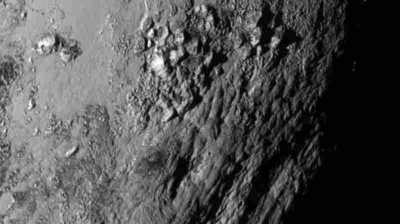 New close-up images of a region near Pluto's equator reveal a giant surprise: a range of youthful mountains.