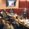 In this image taken from video, James Holmes (upper far left) listens to defense attorney Daniel King give closing arguments during Holmes' trial in Centennial, Colo., on Tuesday. Holmes was found guilty Thursday of first-degree murder in the deaths of 12 people at a Colorado theater.