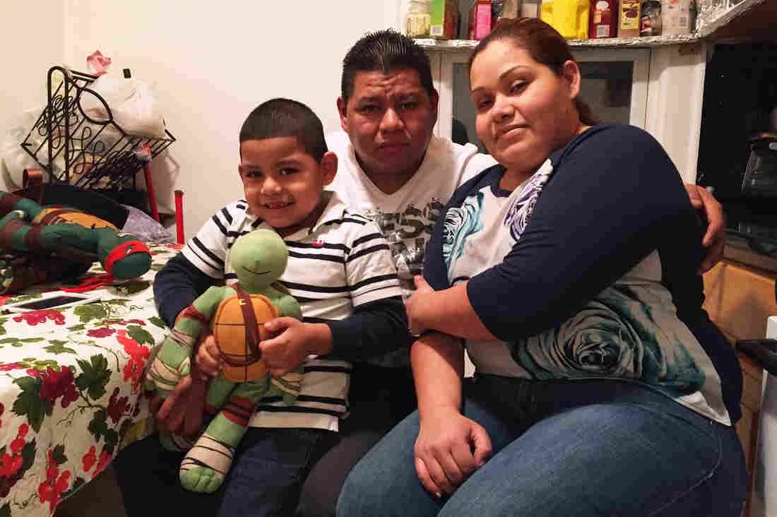 Wilfredis Ayala, an unauthorized immigrant from El Salvador, lives on Long Island, N.Y., with his U.S.-born son, Justin, and Justin's mother, Wendy Urbina.