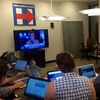 The Clinton campaign's debate watch war room was actually just a conference room with a big-screen TV at the front. Fifteen or so staffers huddled over their laptops ready to pounce.