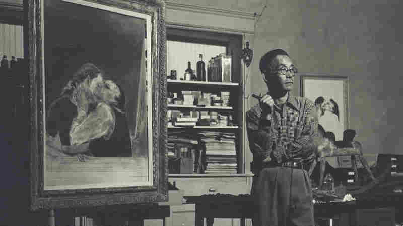 Artist Yasuo Kuniyoshi, seen here in his New York studio in 1940, exhibited with Georgia O'Keeffe and Edward Hopper. But his work was quickly forgotten after his death in 1953.