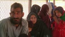 Afghan refugees return home reluctantly