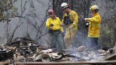 Another body has been found in a burned-out home in Northern California, bringing the death toll to six from two of the state's more destructive wildfires in recent memory, authorities said Wednesday.