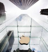 File photo - The Apple logo hangs in a glass enclosure above the 5th Ave Apple Store in New York, Sept. 20, 2012.  