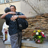 Austin Police Chief Art Acevedo hugs another mourner at a 2014 prayer service following a deadly car crash at the South by Southwest festival. The driver who plowed into a crowd outside a music venue has been convicted of capital murder.