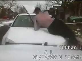 US SHELBY CAR WITH MAN ON BONNET HITS POLICE CRUISER