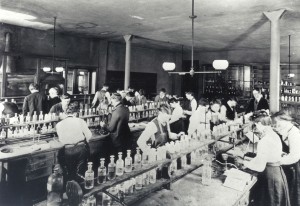 Students work in a chemistry lab in the 1890s.