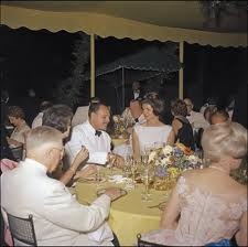 Seen here during the state dinner the Kennedys hosted by Pakistan's president at Mount Vernon, Jacqueline Kennedy innovated these traditional events by using round, rather than square tables. (JFKL)