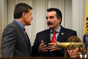 Assembly Speaker Vincent Prieto (right) talks with Assembly Judiciary Committee Chairman John F. McKeon before a meeting on the plan.