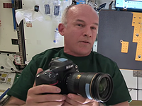 NASA astronaut Jeff Williams showcases ISS photography equipment