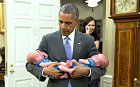 June 17, 2015: “The President carries the twin boys of Katie Beirne Fallon, Director of Legislative Affairs, into the Oval Office just a few months after they were born.”