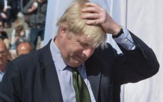 Comment: Boris Johnston rubs his thatch of golden hair with an expression of exhaustion on his face